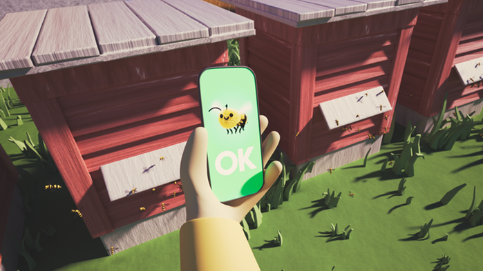 En mobiltelefon som fotar ett bi med en "OK"-stämpel på sig.